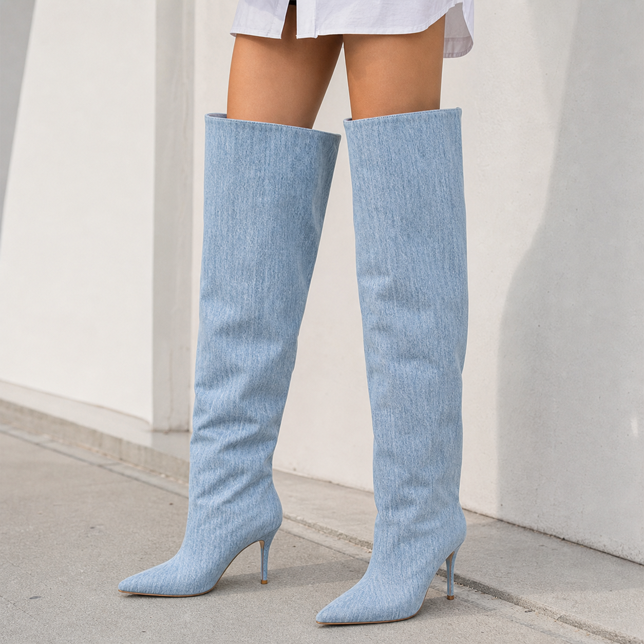 Oversized Denim Thigh-High Boot on leg editorial fit image, Yardlow & Sons women's boots